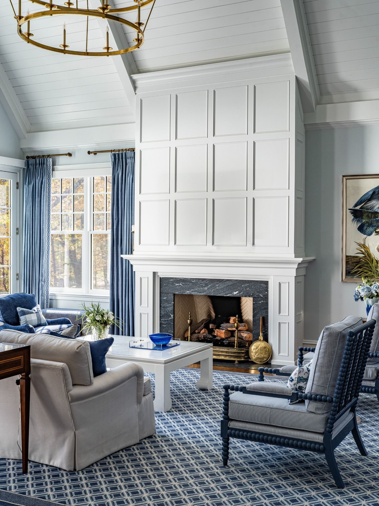 A living room filled with furniture and a fireplace.