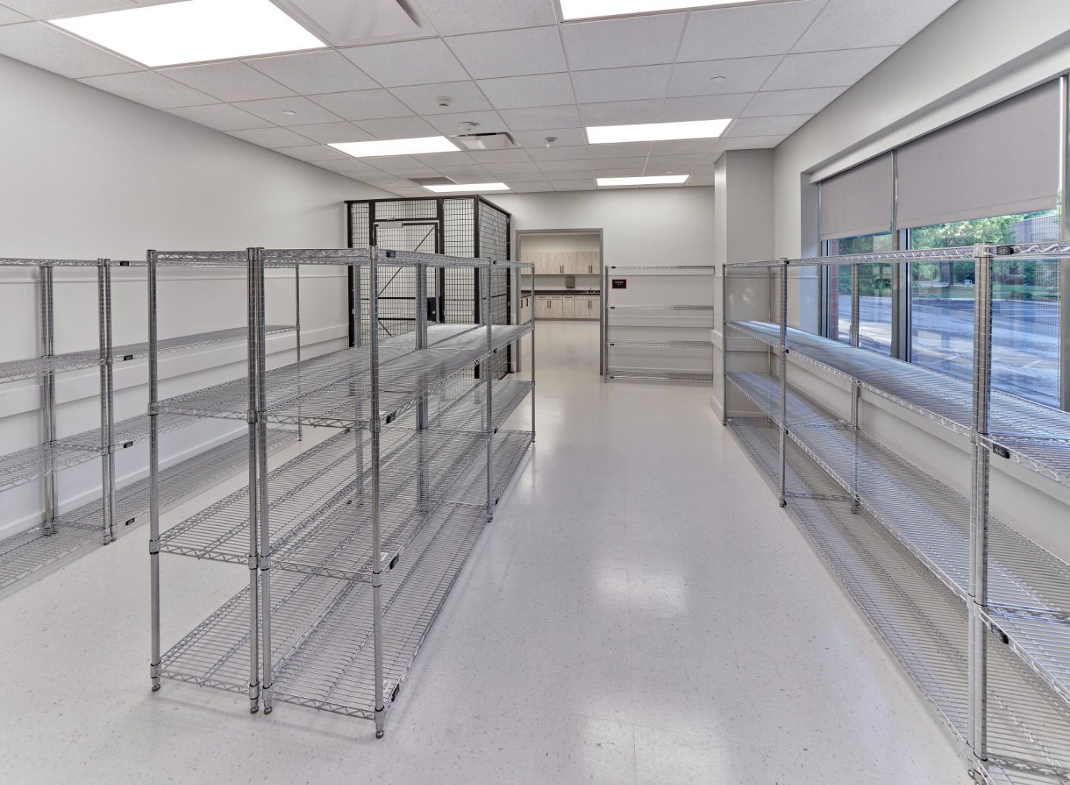 There are a lot of shelves in this room.