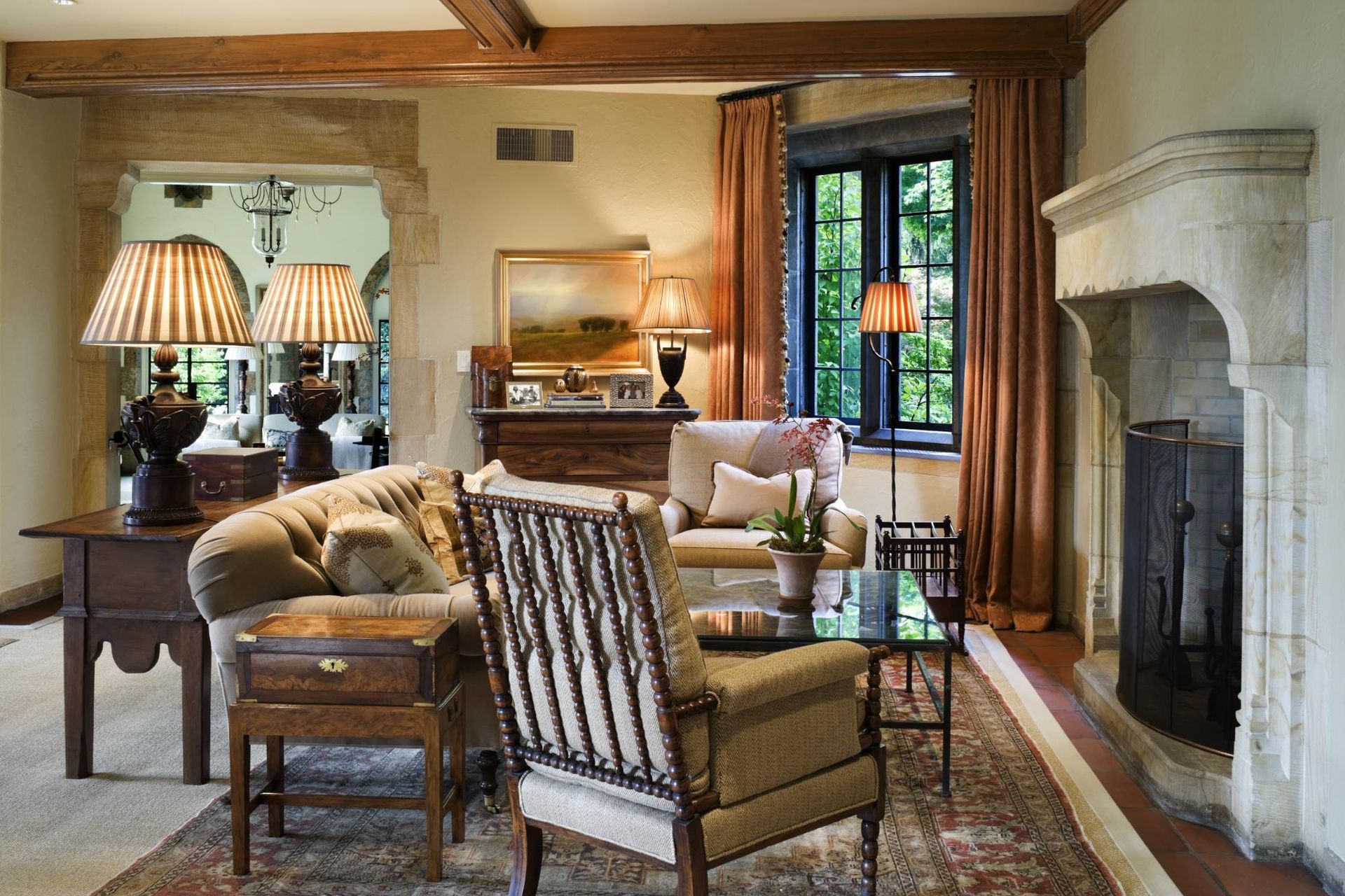 A living room filled with furniture and a fireplace