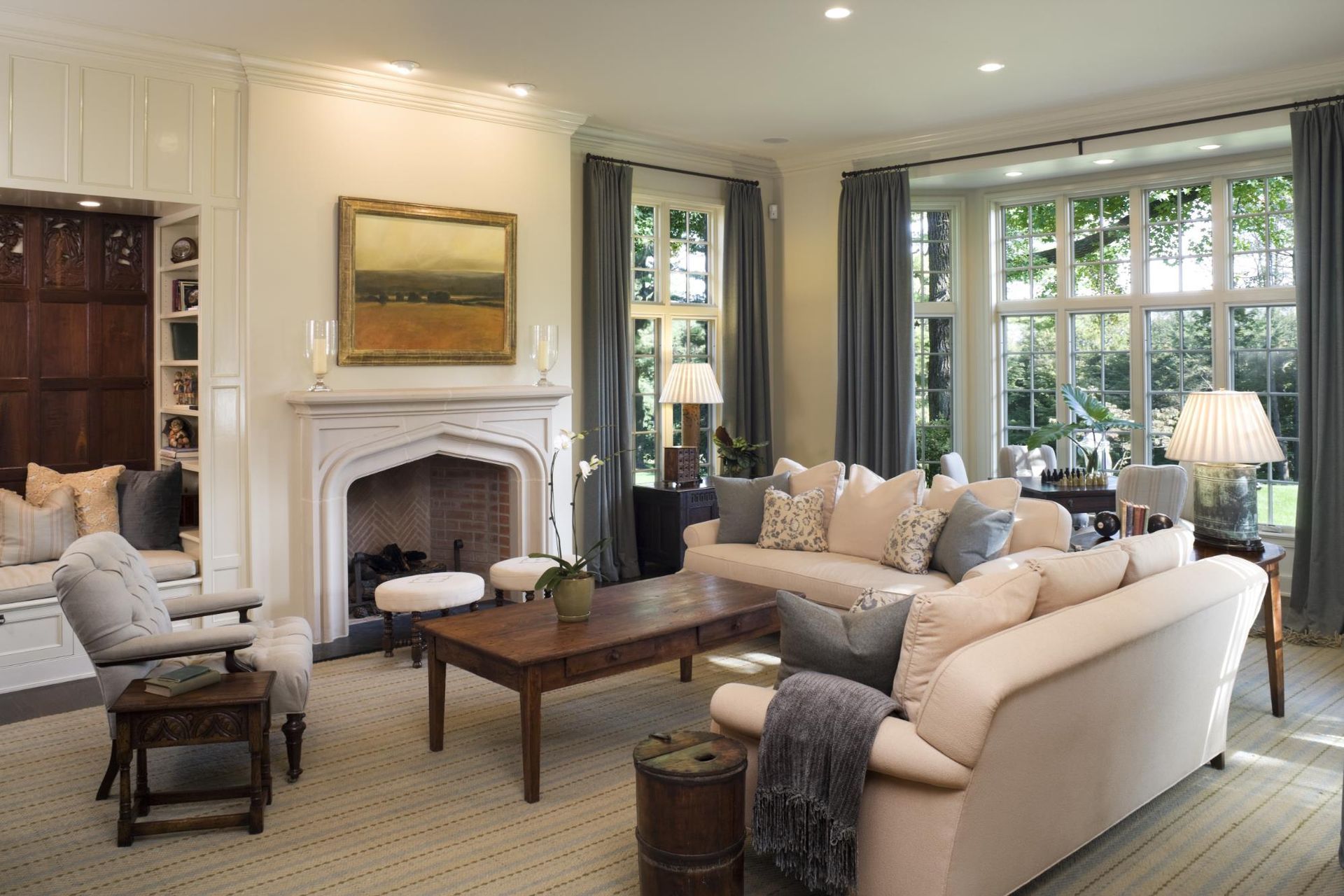 A living room filled with furniture and a fireplace