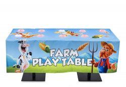 A farm play table with a cow and a farmer on it.