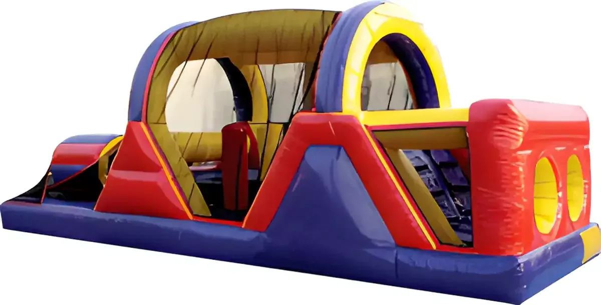 A red , yellow and blue inflatable obstacle course on a white background.