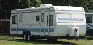 Motor home parked on a wide lawn