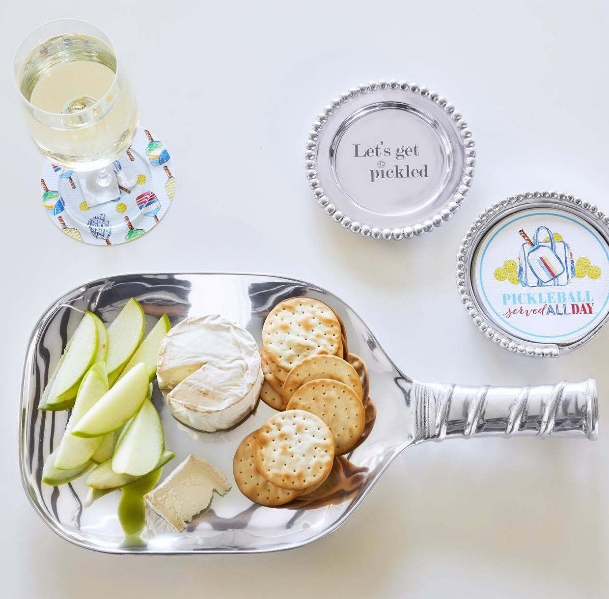 A tray of food with a plate that says let 's get pickled