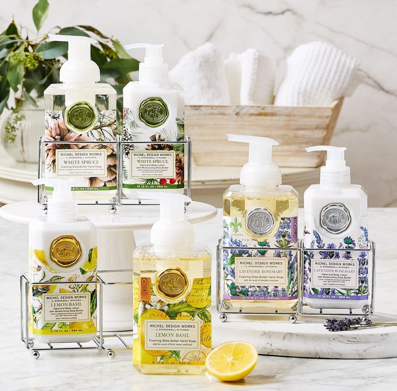 A bunch of bottles of soap are sitting on a table