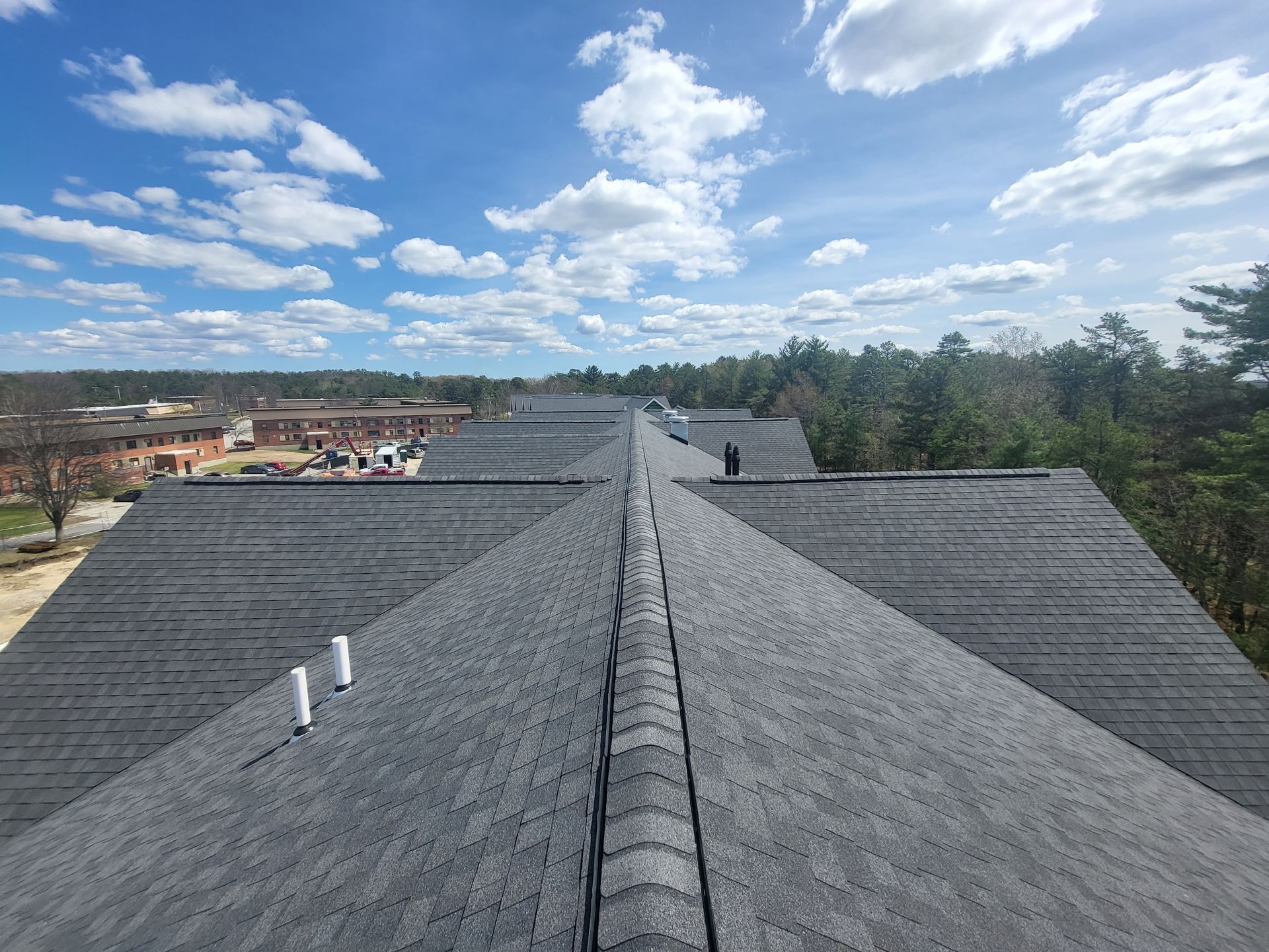 The roof of a building with a lot of shingles on it.