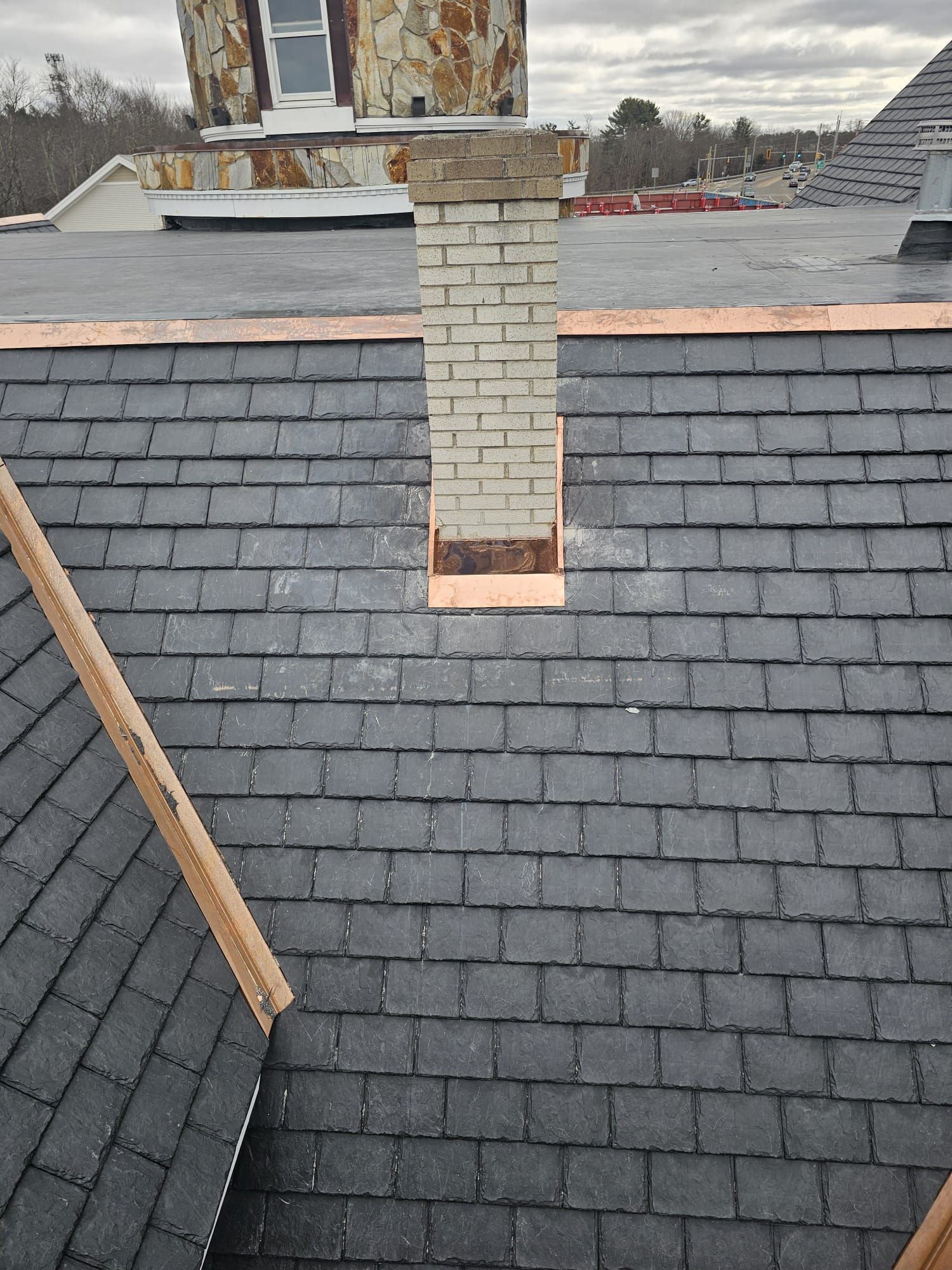 A roof with a chimney on top of it