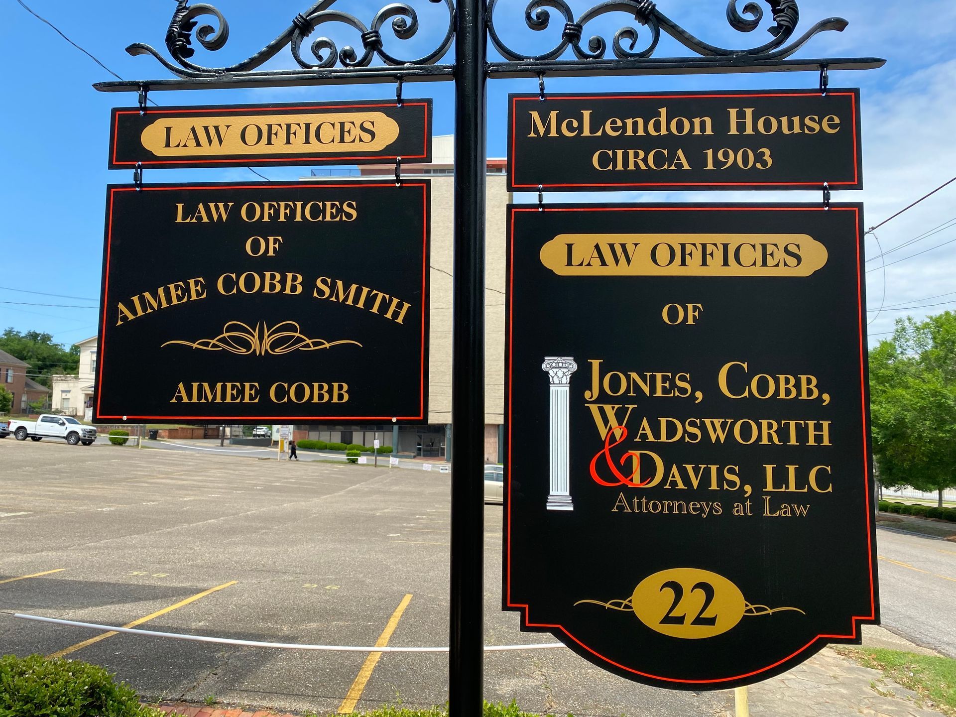 A sign for the law offices of Jones, Cobb, Wadsworth & Davis, LLC