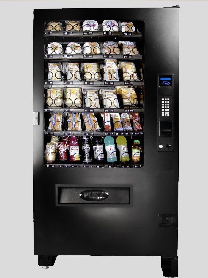 A vending machine filled with snacks and drinks on a white background.