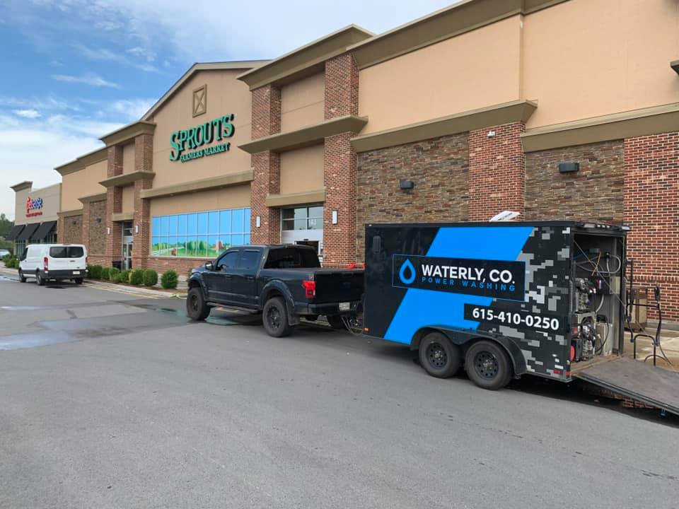 Company truck and commercial building