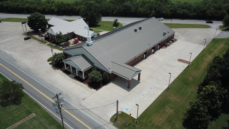 Company truck and church