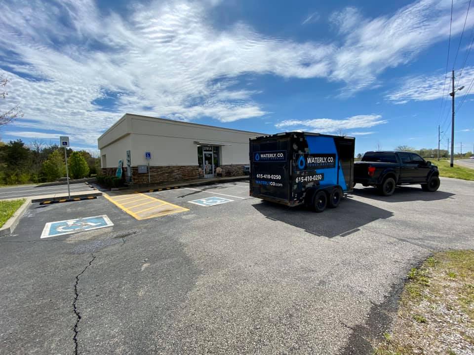 Company truck and commercial building