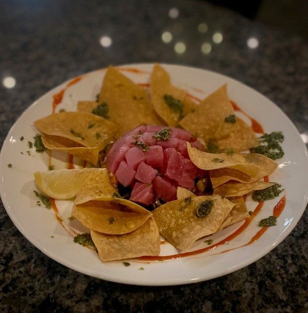 A close up of a plate of food on a table.