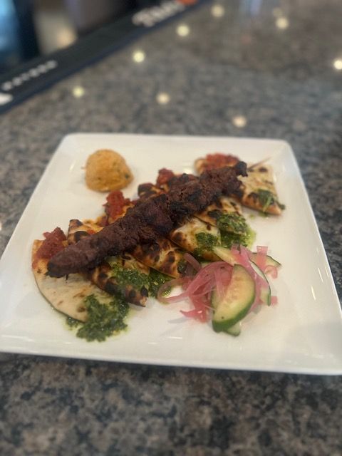 Beef Shawarma Kebabs with Pita Bread, Hummus, Sun Dried Tomato, and Basil Pesto