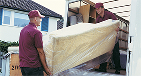 movers carrying a couch