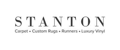 Logo for Stanton, a carpet and flooring company. The word Stanton is above descriptive text.