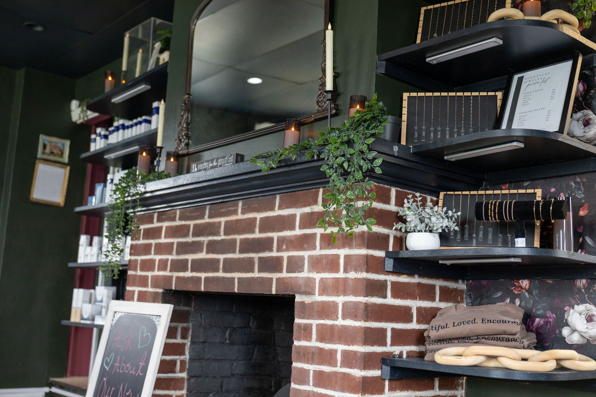 Cozy brick café bar with shelves, hanging lights, plants, and pastries on display