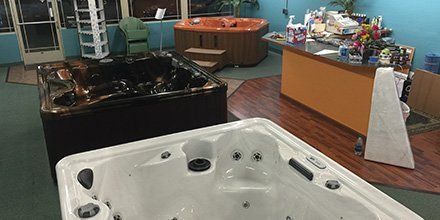 a marquis hot tubs displayed in the showroom