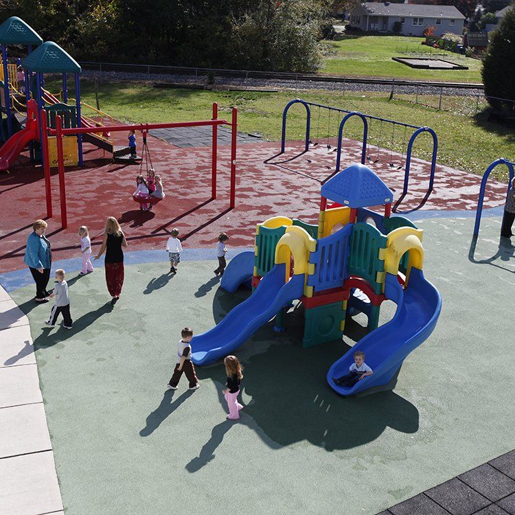 A group of children are playing in a playground