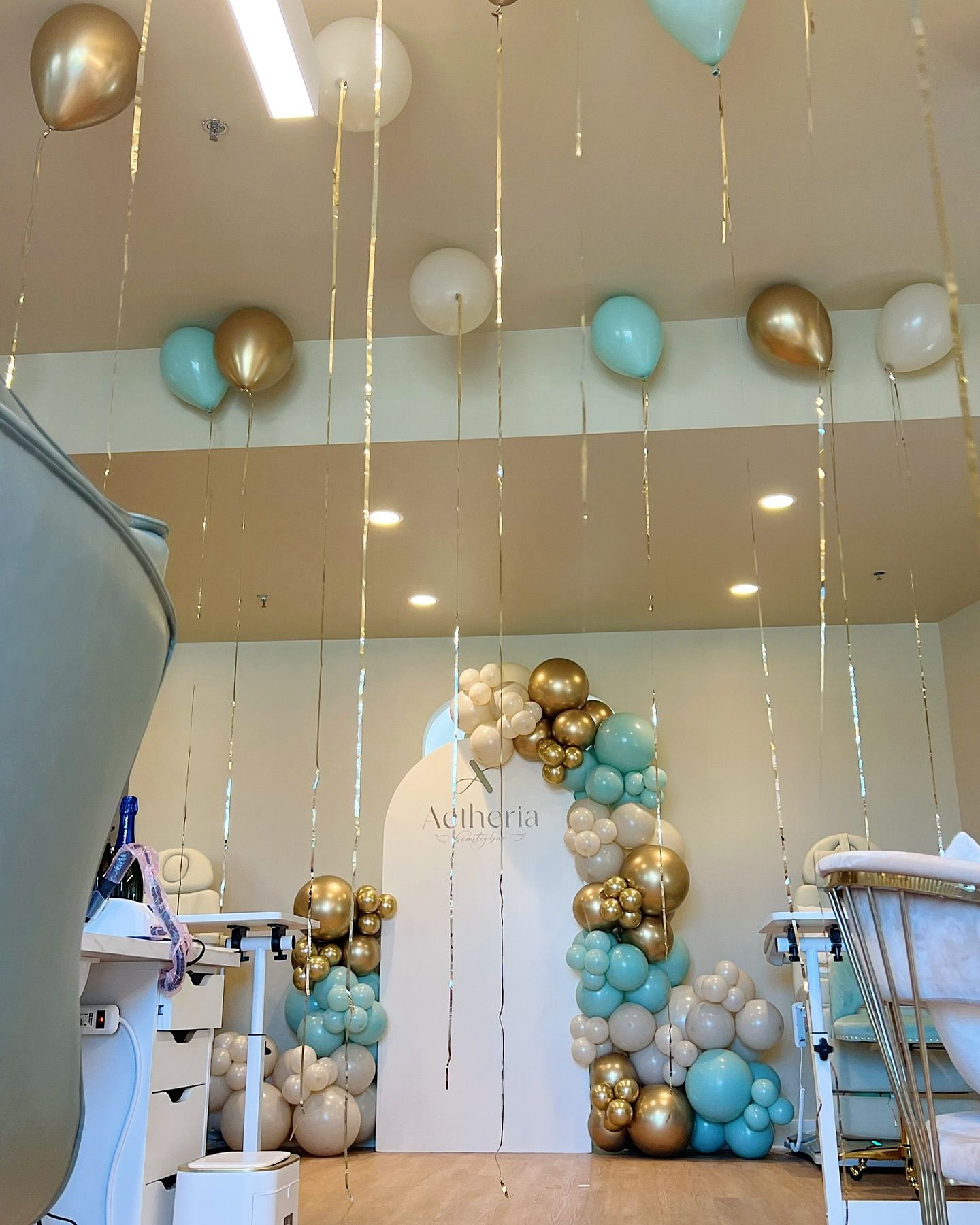 A room with balloons hanging from the ceiling