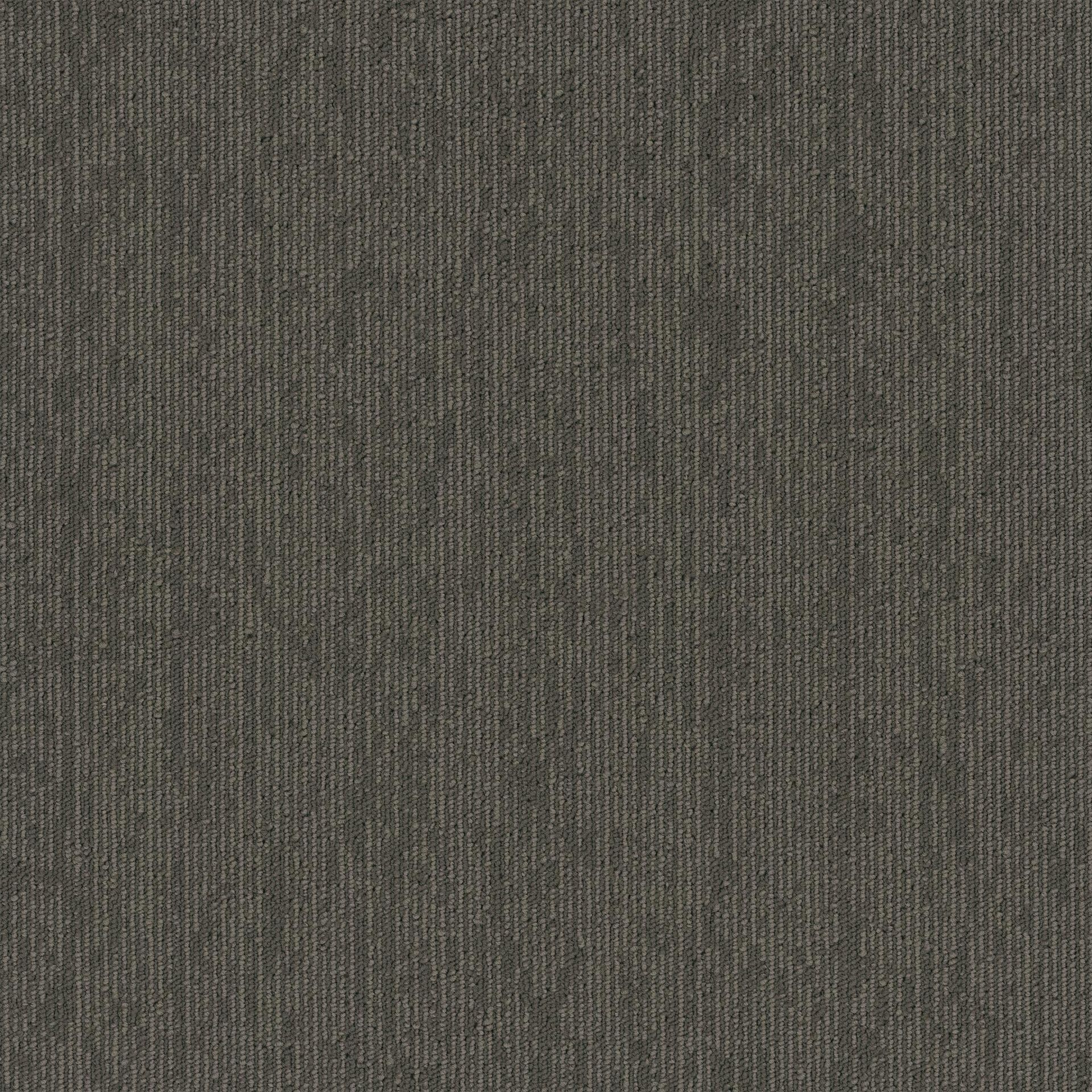 A close up of a gray carpet texture.