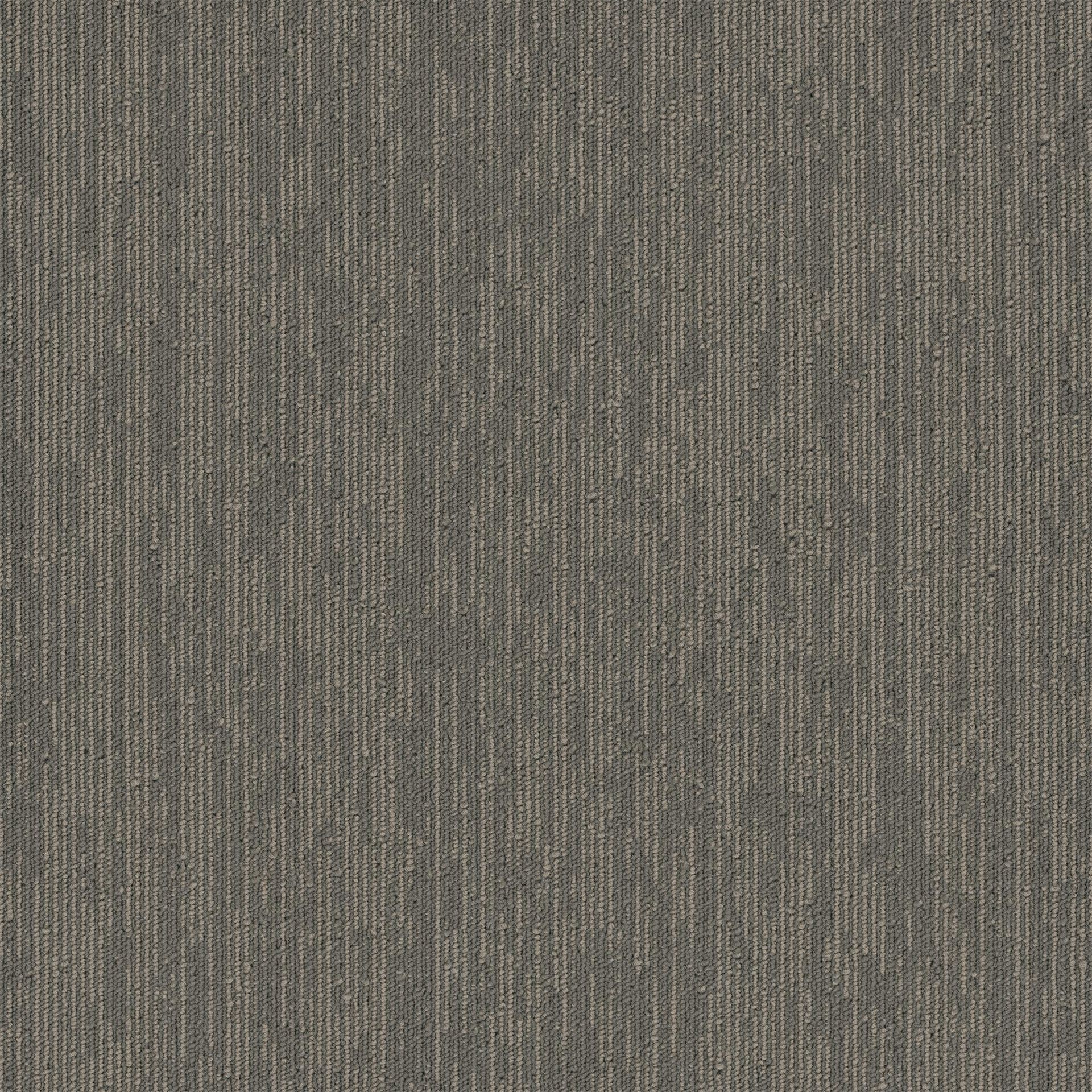 A close up of a gray carpet with a striped pattern.