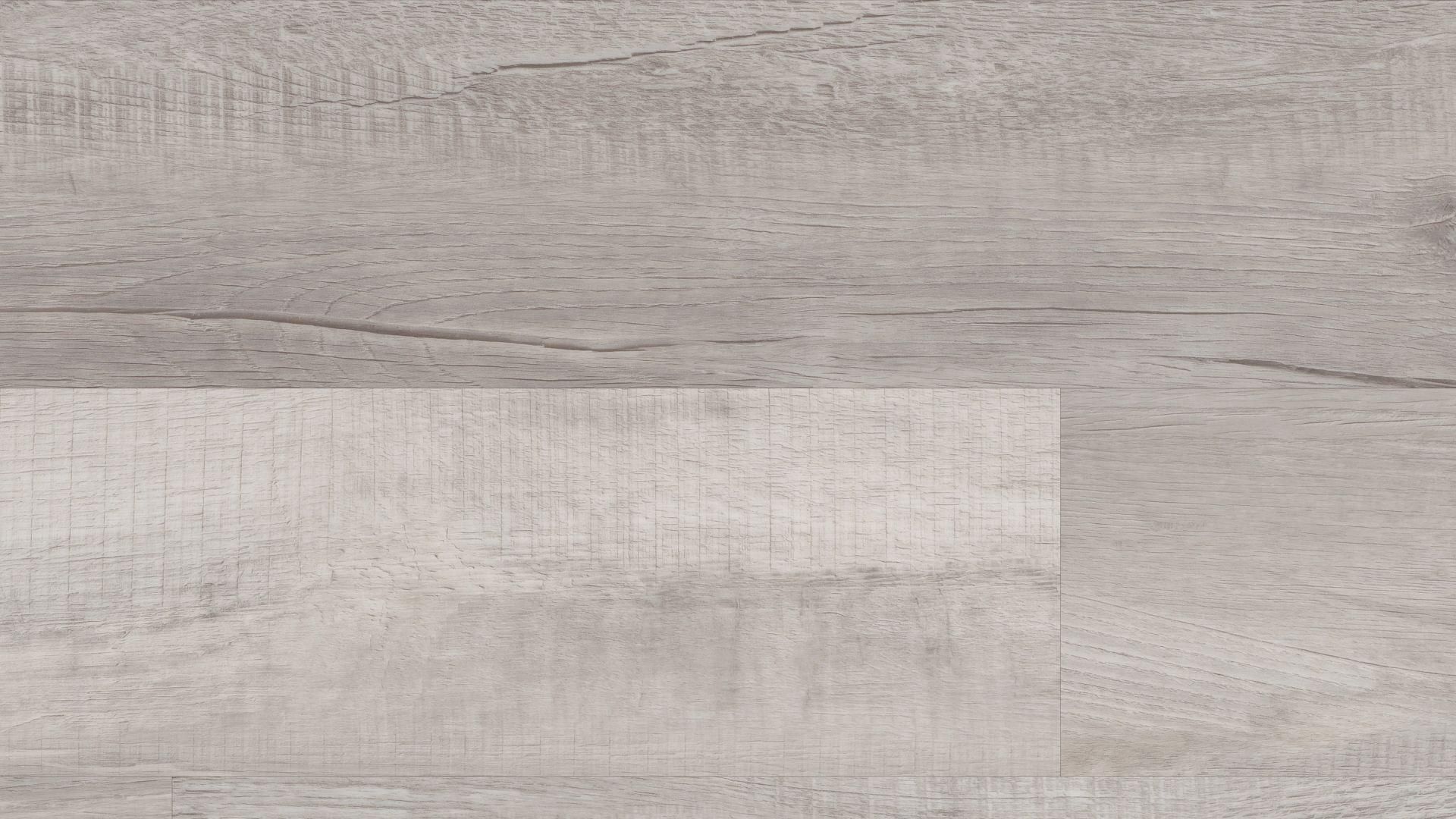 A close up of a gray wooden floor with a white border.