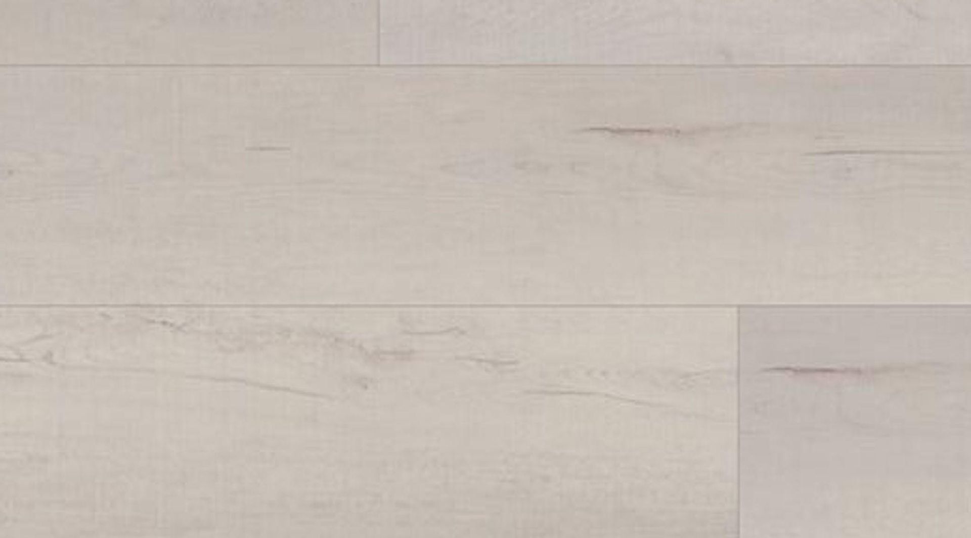 A close up of a white wooden floor.
