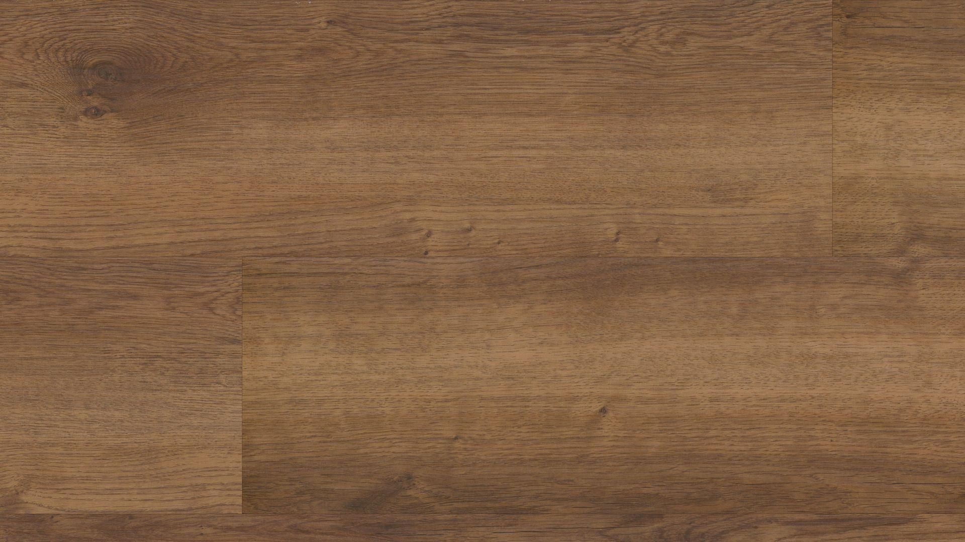 A close up of a wooden floor with a grainy texture.