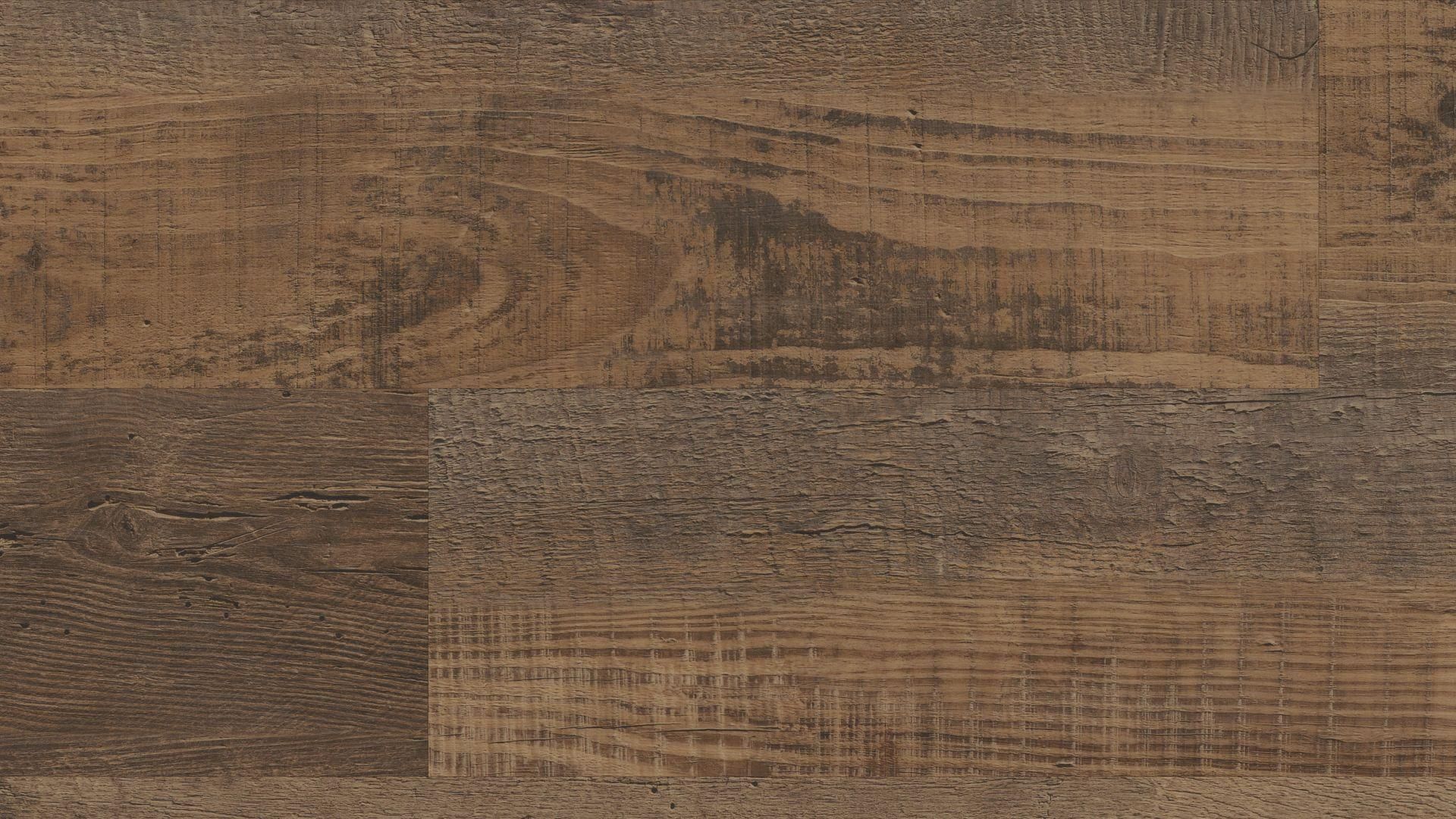 A close up of a wooden floor with a grainy texture.