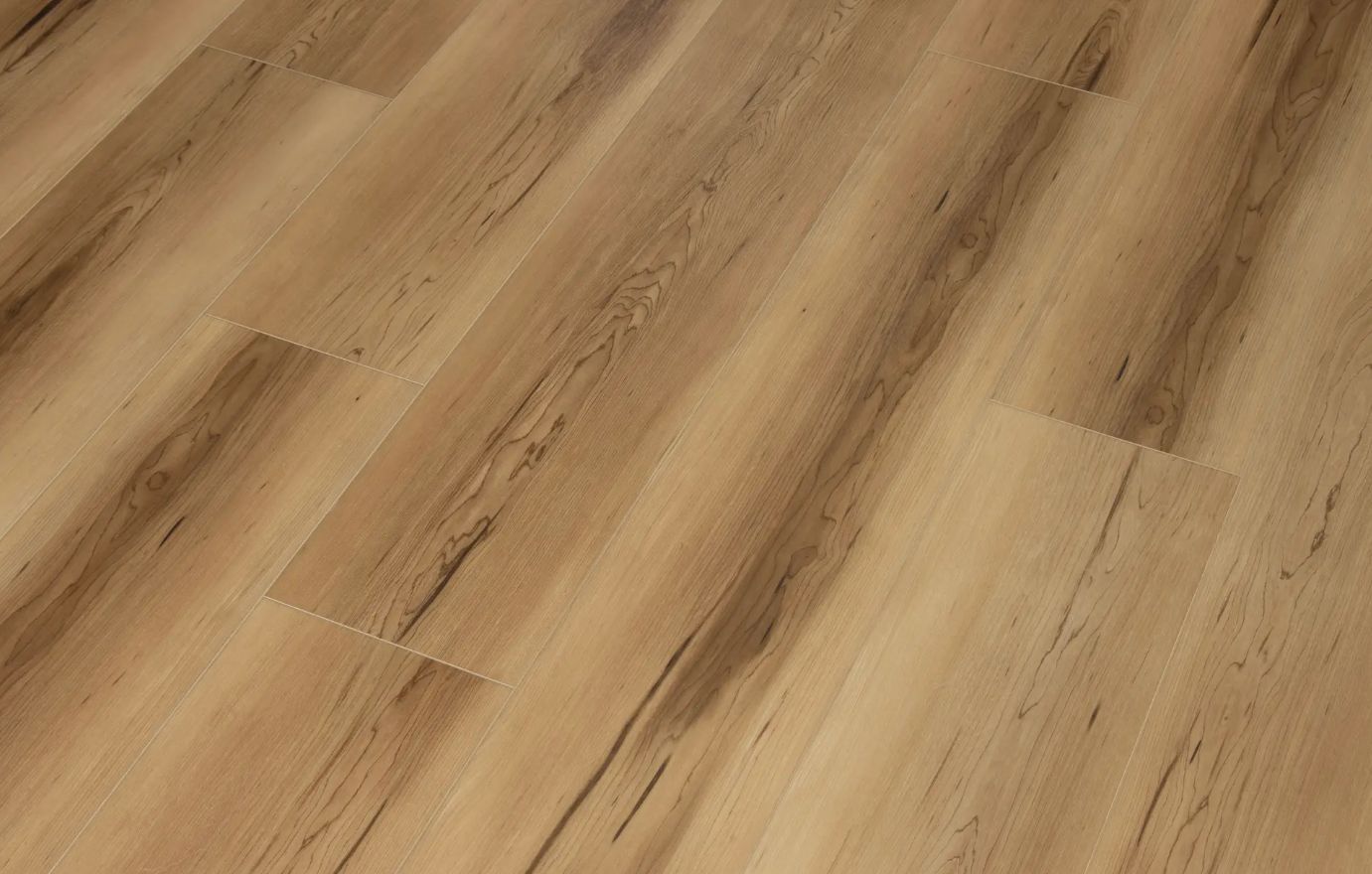 A close up of a wooden floor in a room.