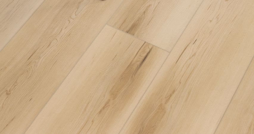 A close up of a light brown wooden floor.