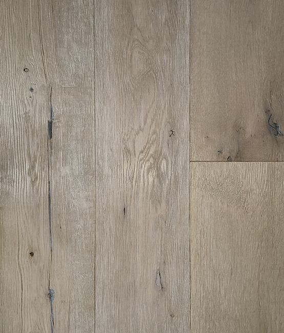 A close up of a wooden floor with a grain and texture.