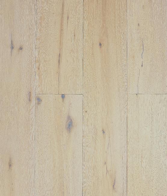 A close up of a white wooden floor.