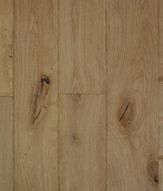 A close up of a wooden floor with a grain and texture.