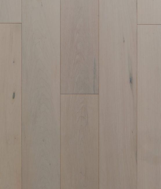 A close up of a white wooden floor.
