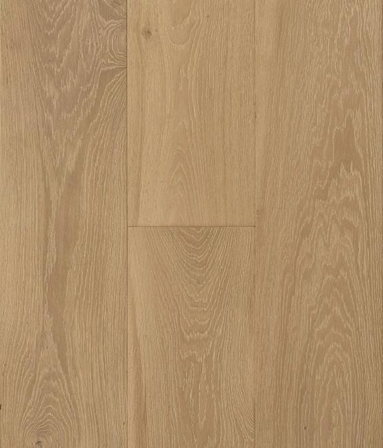 A close up of a light brown wooden floor.