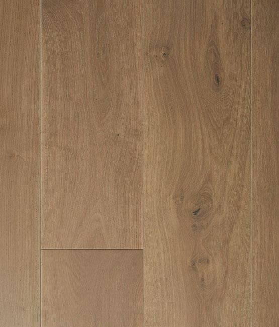 A close up of a wooden floor with a grain and texture.