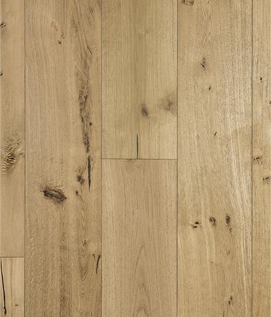 A close up of a wooden floor with a grain and texture.
