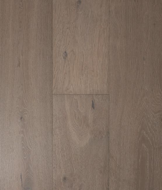 A close up of a wooden floor with a grain and texture.