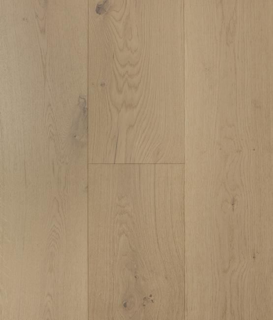A close up of a light brown wooden floor.
