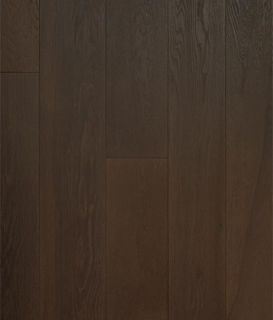 A close up of a dark brown wooden floor.