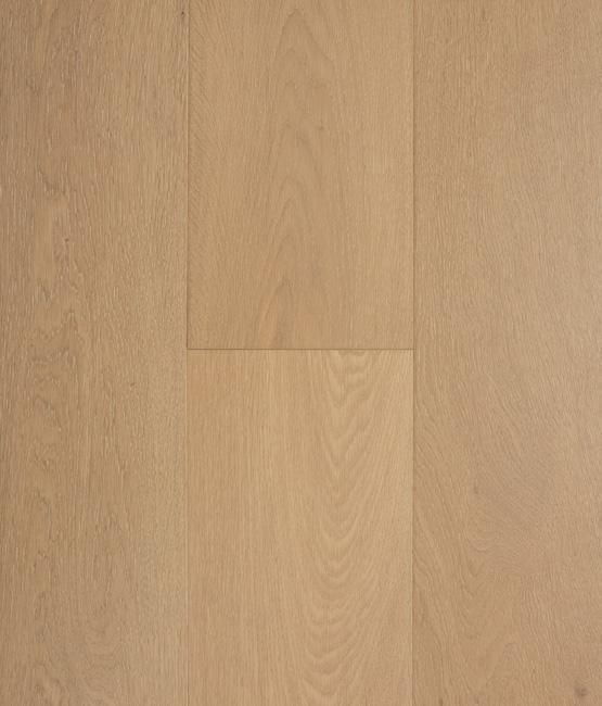 A close up of a light brown wooden floor.