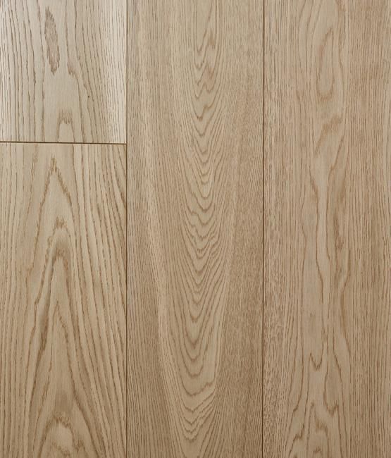 A close up of a wooden floor with a grain pattern.