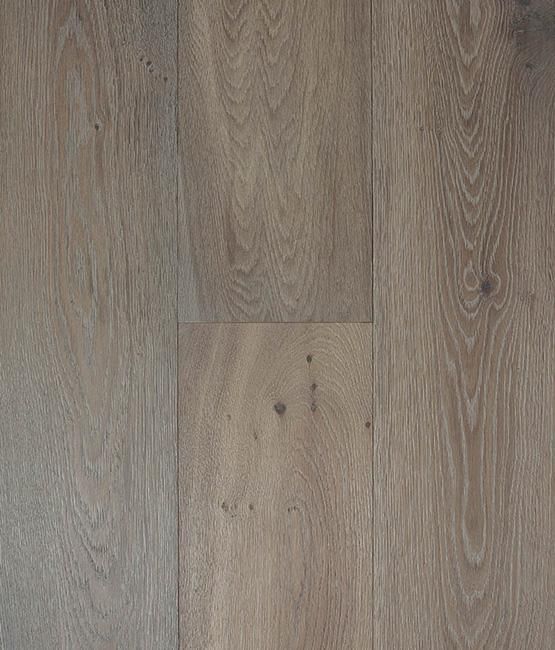 A close up of a wooden floor with a grain and texture.