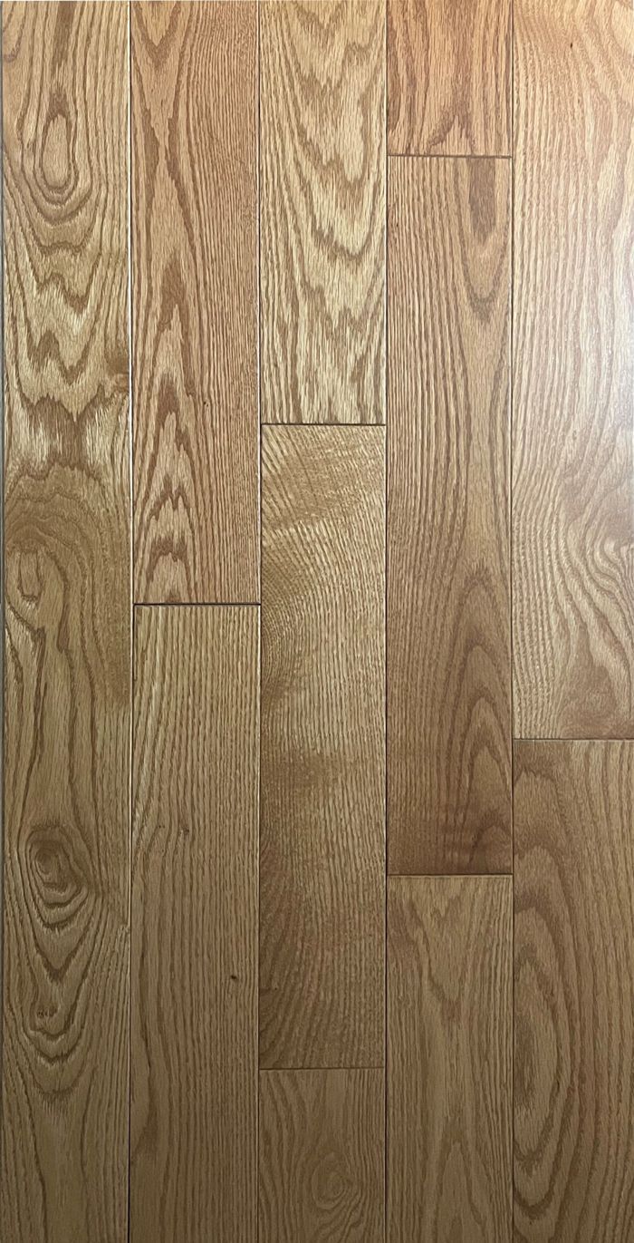 A close up of a wooden floor with a grain pattern.