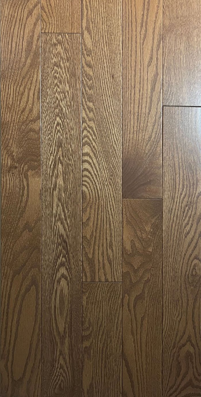 A close up of a wooden floor with a grain pattern.