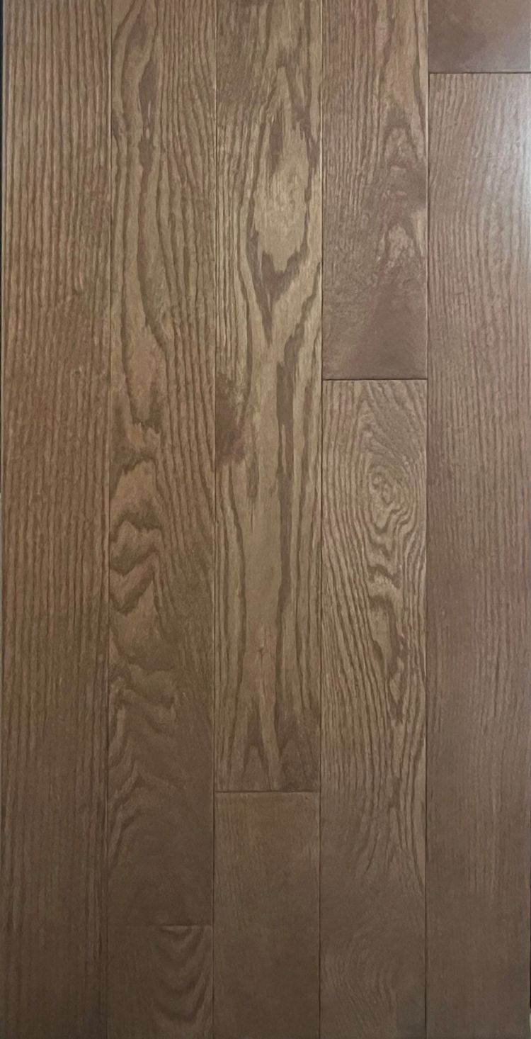 A close up of a wooden floor with a grain and texture.