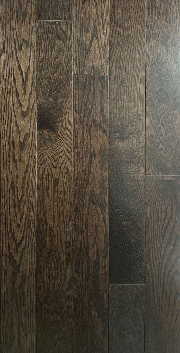 A close up of a wooden floor with a grain and texture.