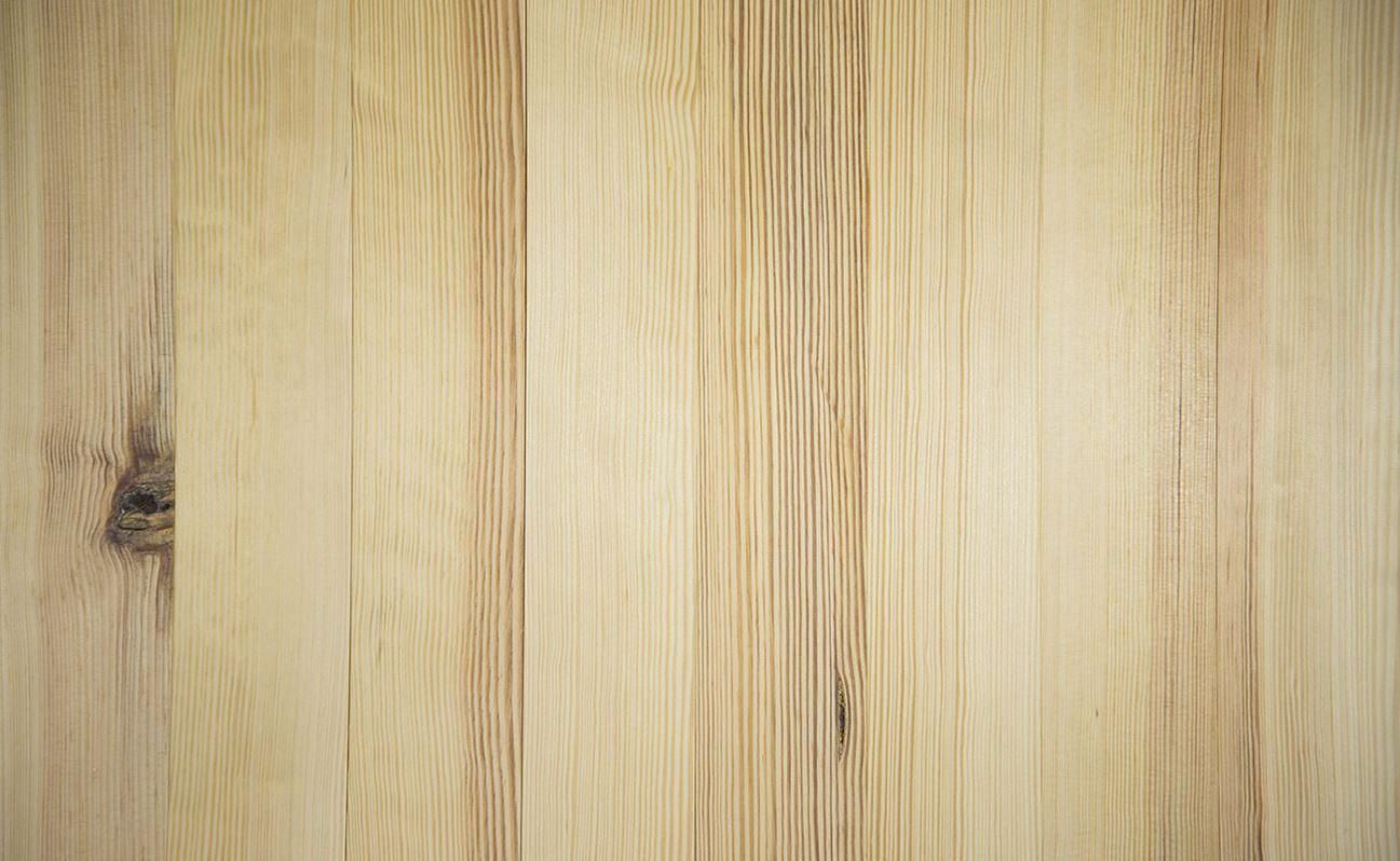A close up of a wooden surface with a grain.